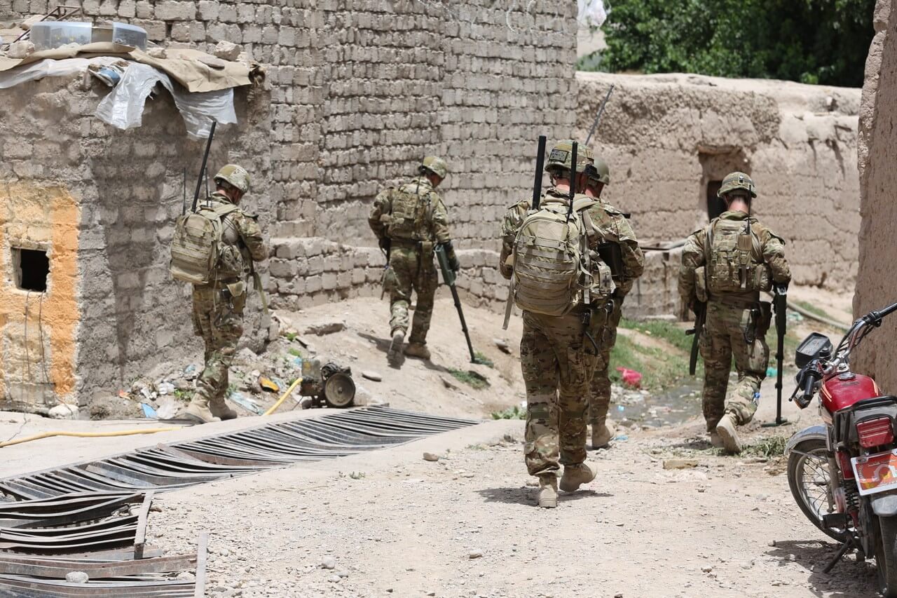 4 Section, 2 Troop conduct search within Tarin Kowt, Afghanistan in 2013.